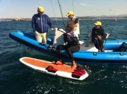 ISAF president Goran Petersson and vice president Teresa Lara getting detailed information about kite racing from the sailors / IKA KTA