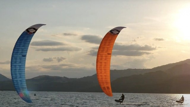 R1V4 foil racing at sunset
