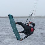 Kitesurfing Technique - Pop Back Roll to Toeside with Front Hand Grab