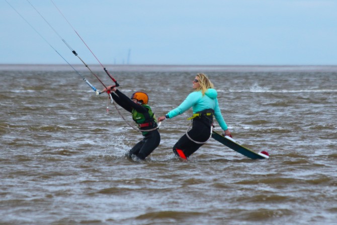 Sometimes it takes two to hold an 8m down in 18 knots! Photo: Charlie Railton