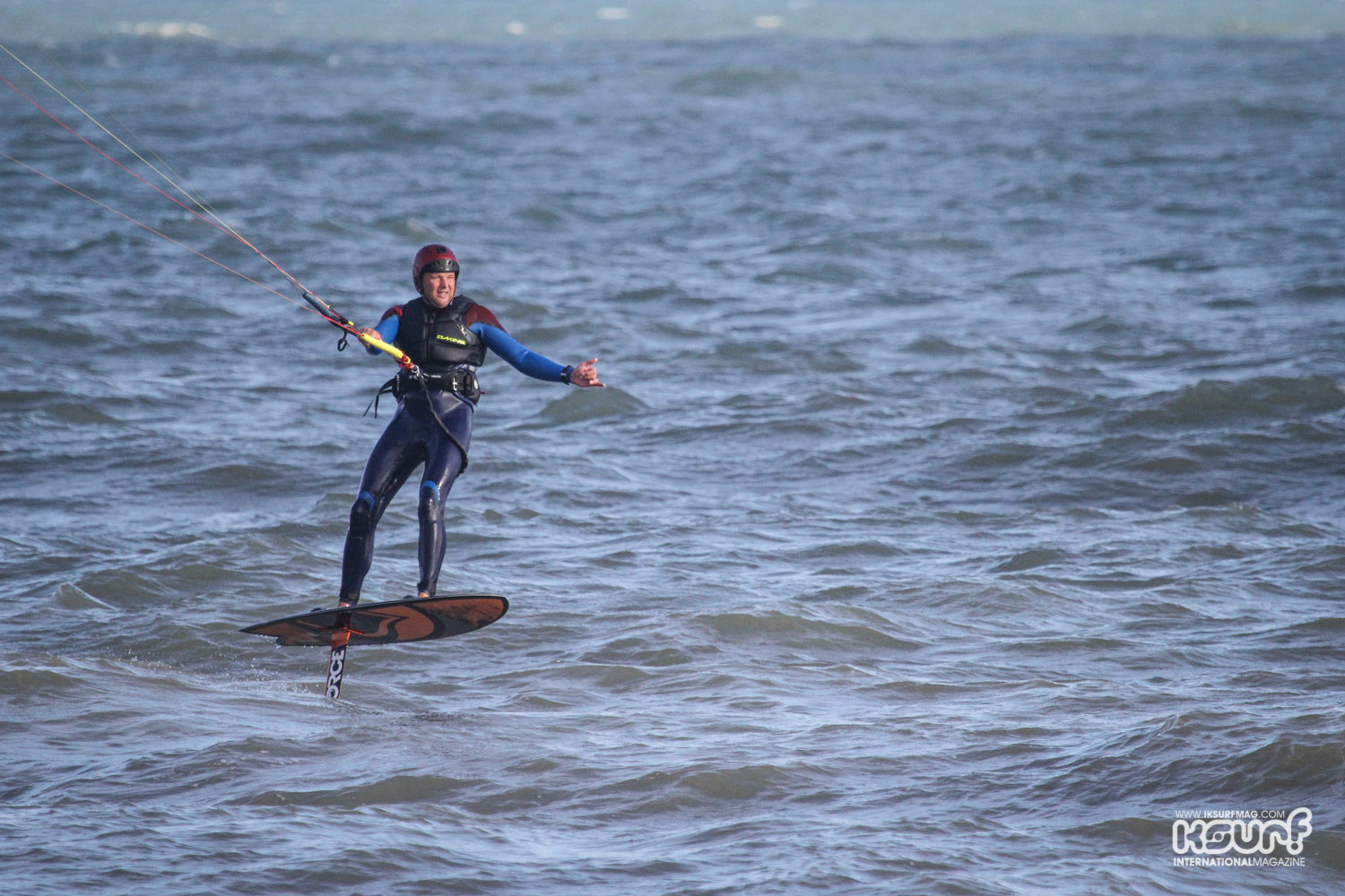 Look Mum, one hand!  Riding one handed actually helps with the balance! Photo: Mary Booth