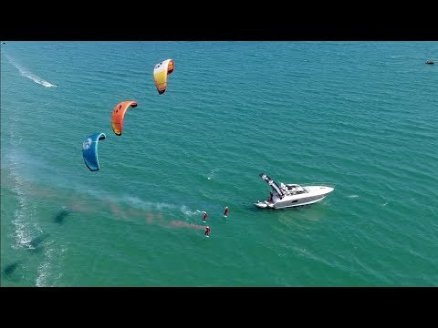 Cabrinha Team performs a colored smoke kite stunt air display