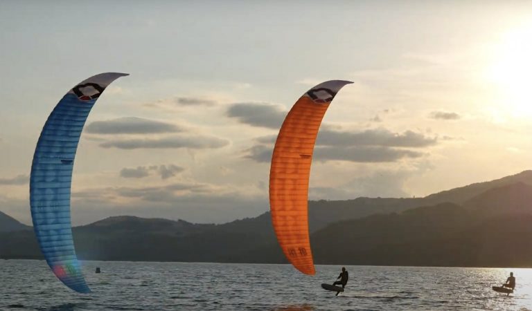R1V4 foil racing at sunset