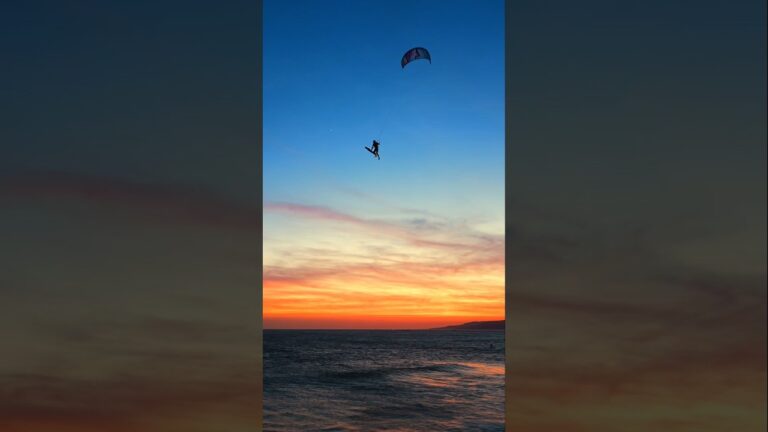 kitesurfing in a crazy sunset